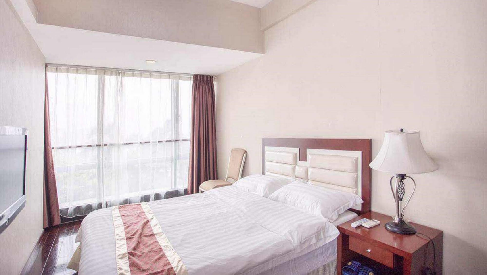 Nuomo Grand Continental Service Apartments-Jinyuan Kuangcsou Kültér fotó